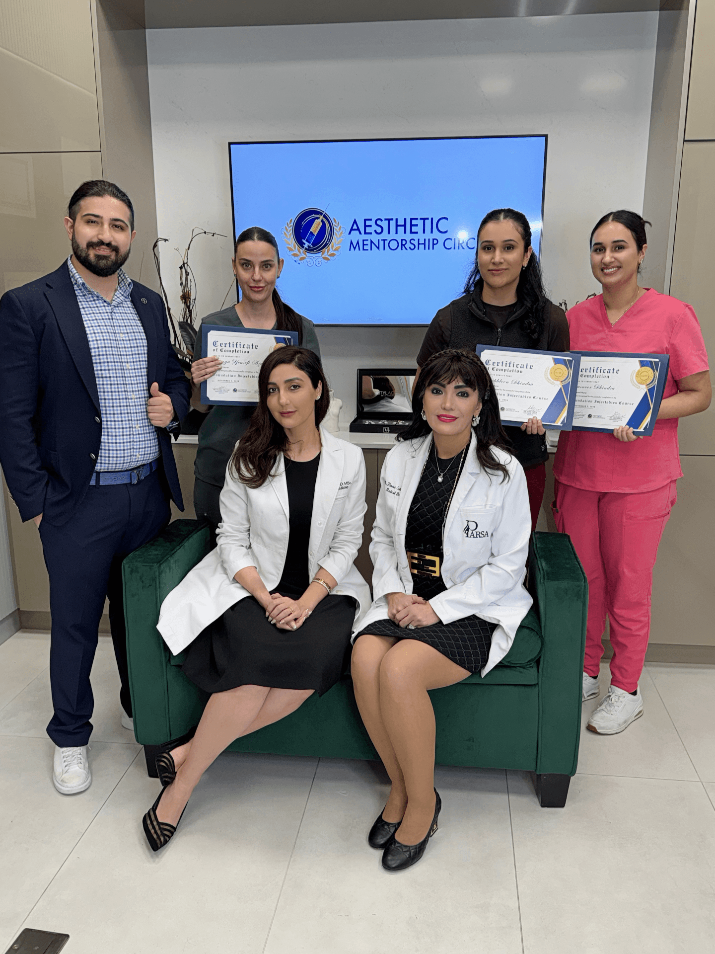 Healthcare professionals participating in physician-guided aesthetic training at Aesthetic Mentorship Circle.