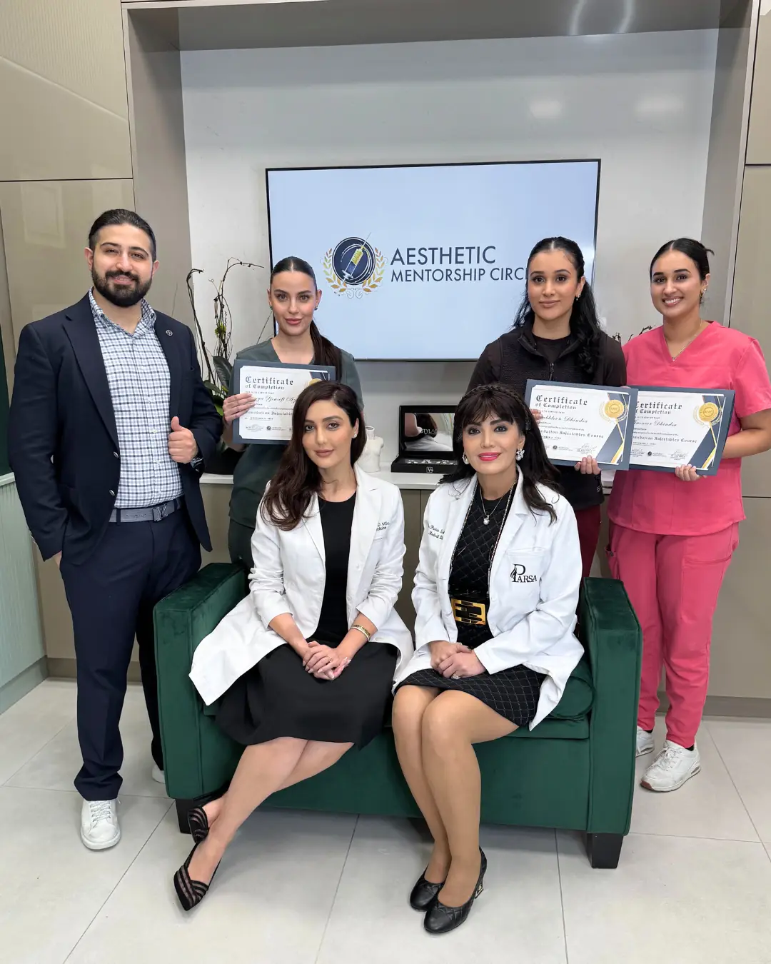 Healthcare professionals participating in physician-guided aesthetic training at Aesthetic Mentorship Circle.